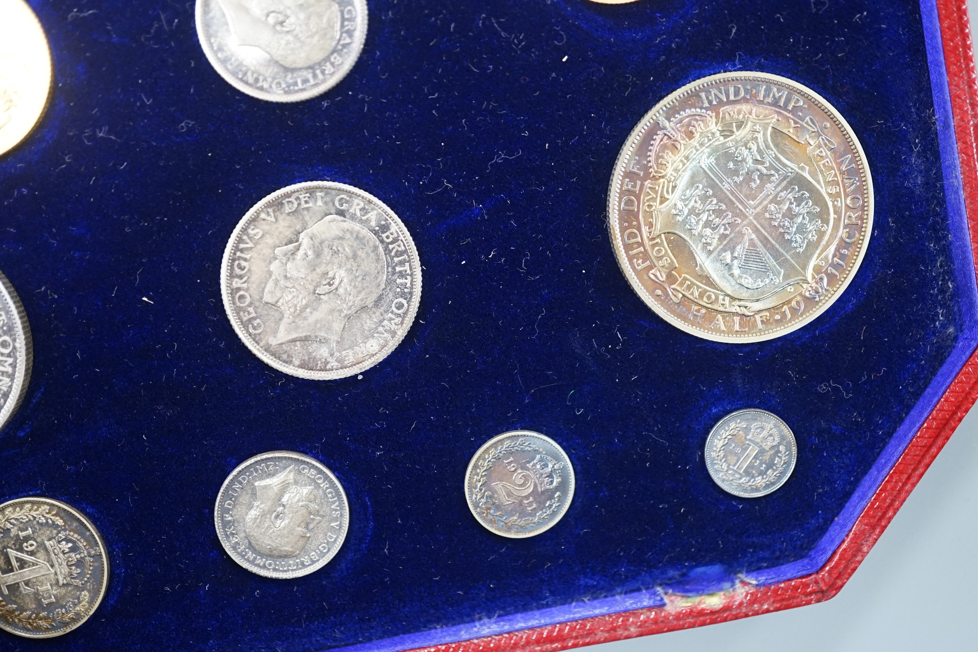 A George V specimen coin set 1911, comprising gold sovereign, and half sovereign, silver half crown, florin, shilling, 6d and Maundy 1d– 4d, UNC with toning to silver coins